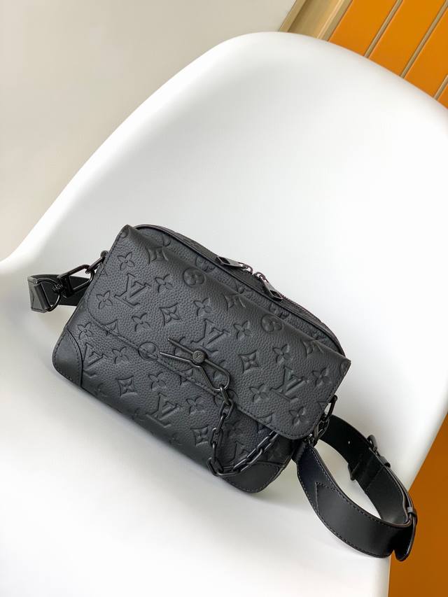 M46795 Black Floral M23742 Embossed Top-Tier Original Steamer Messenger Bag. Thi