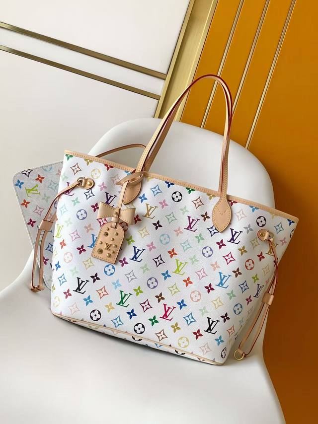 M27787 with 163 chip This Neverfull medium handbag is inspired by the Louis Vuit