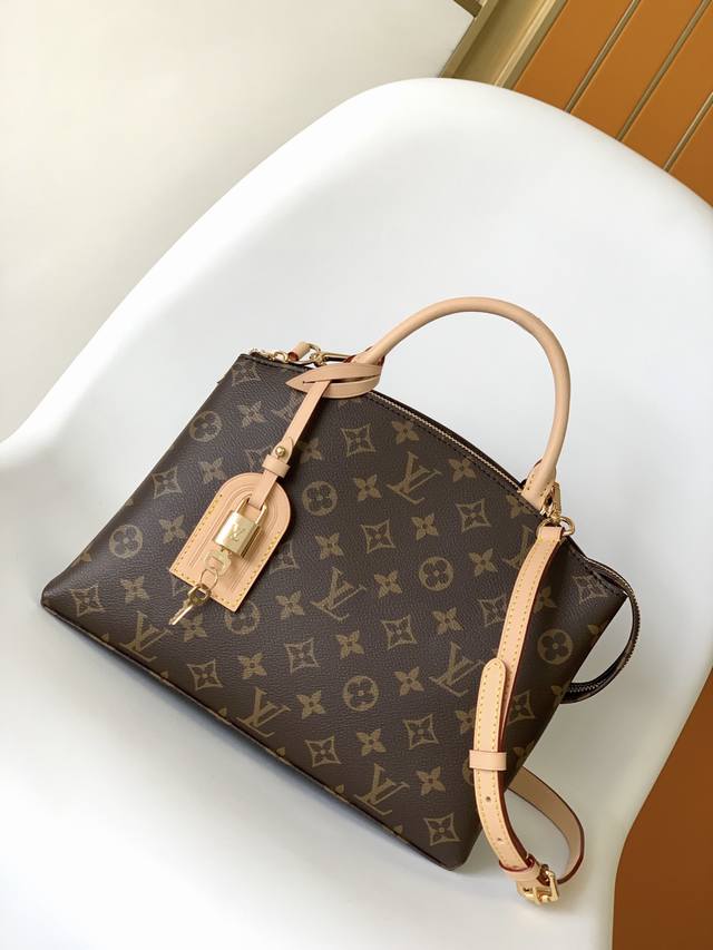 Grand Palais Handbag M45900. The Grand Palais handbag features the Monogram logo