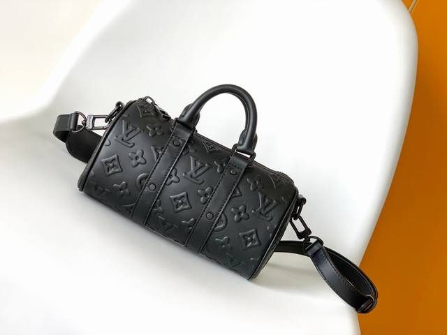 Top-tier original M57960 Black Embossed Pillow Bag with Embossed Logo. This Keep