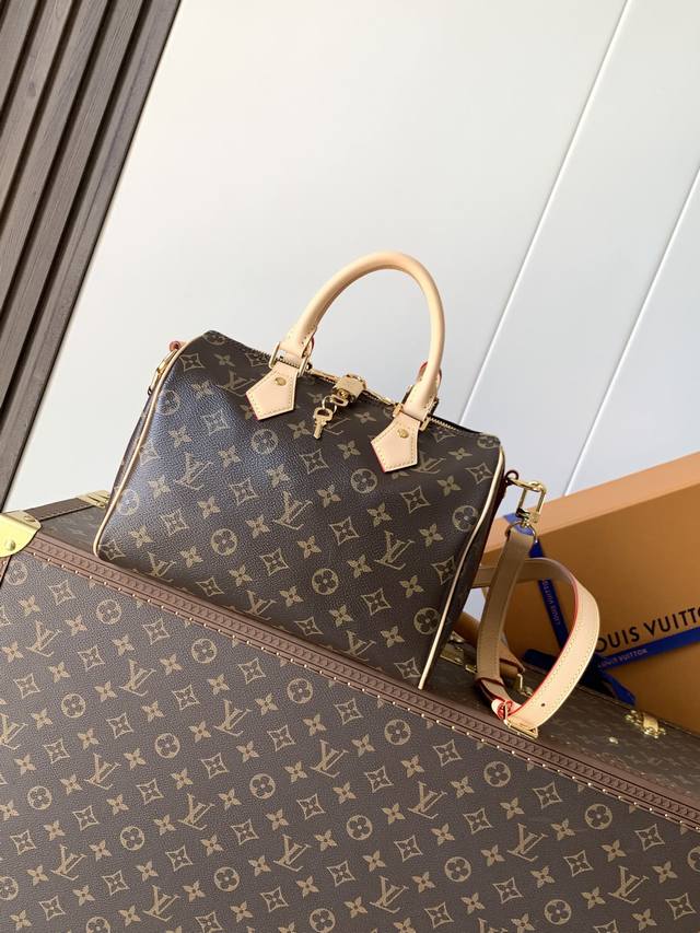 Top-tier original, serial number chip M46977. The Speedy 25 series handbag was o