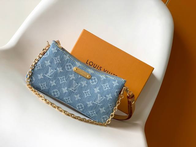 M83532 Top-quality original Monogram Liv pochette in denim that fits snugly agai