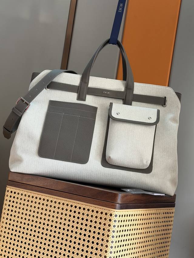 This Dior Normandie handbag seamlessly blends practical design with Dior's haut