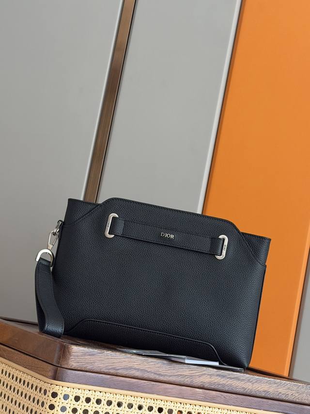 Authentic Development This Dior Normandie A5 triangle clutch is a new addition t