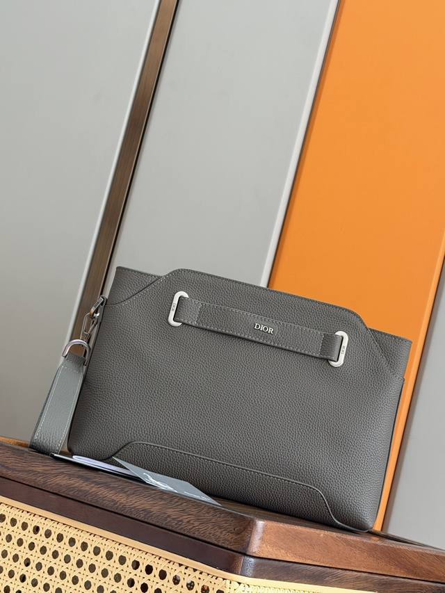 Authentic Development This Dior Normandie A5 triangle clutch is a new addition t