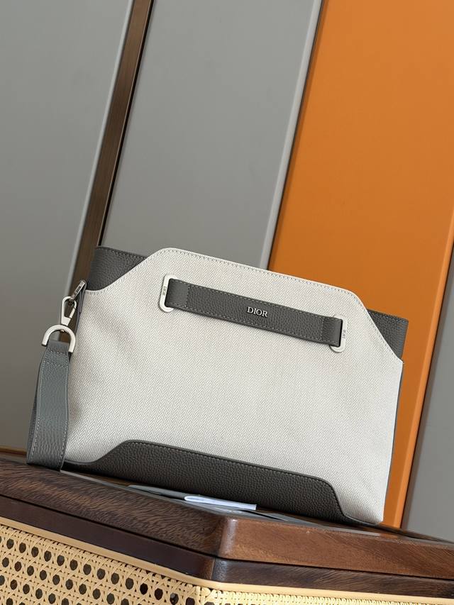 Authentic Development This Dior Normandie A5 triangle clutch is a new addition t