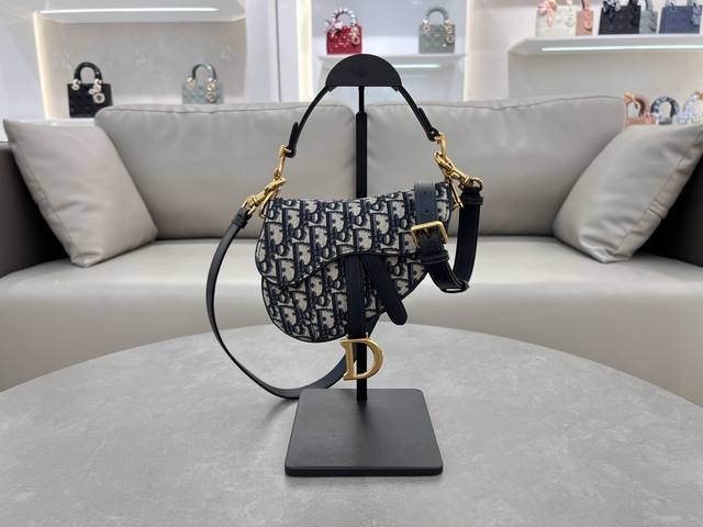 The Dior Monogram Blue Small Saddle Bag with Shoulder Strap is the king of king