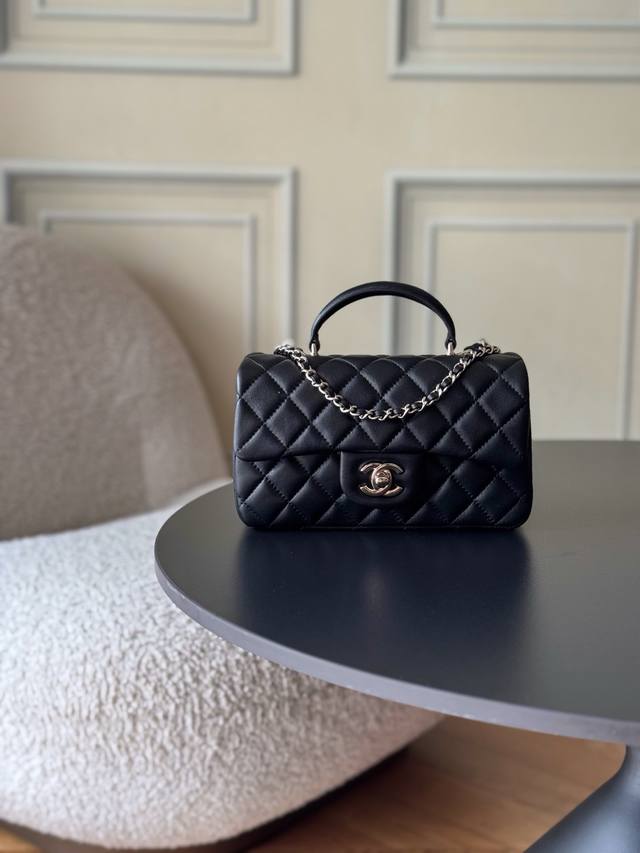 Chanel 21K Latest Mini CF Handle Bag As2431. A classic quilted flap bag with a d