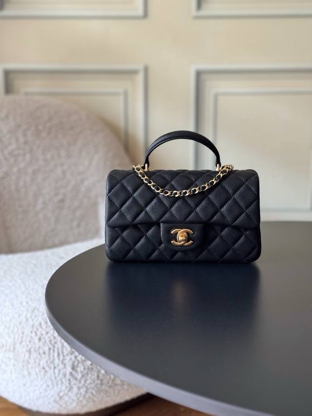Chanel 21K Latest Mini CF Handle Bag As2431. A classic quilted flap bag with a d