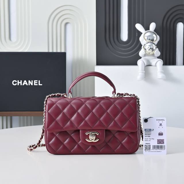Chane* New Handle Cf Burgundy Mini The luster and texture of the lambskin are tr
