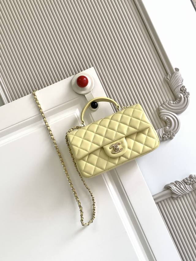 Chanel 21K Latest Mini CF Handle Bag As2431. A classic quilted flap bag with a d