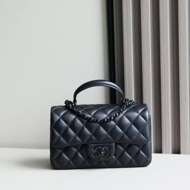 Black and Gold Chanel 21K Latest Mini CF Handle Bag As2431. A classic quilted f