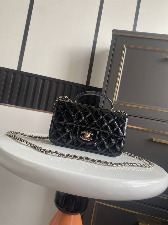 In stock, patent leather Chanel's latest Mini CF Handle tote bag. Featuring a c
