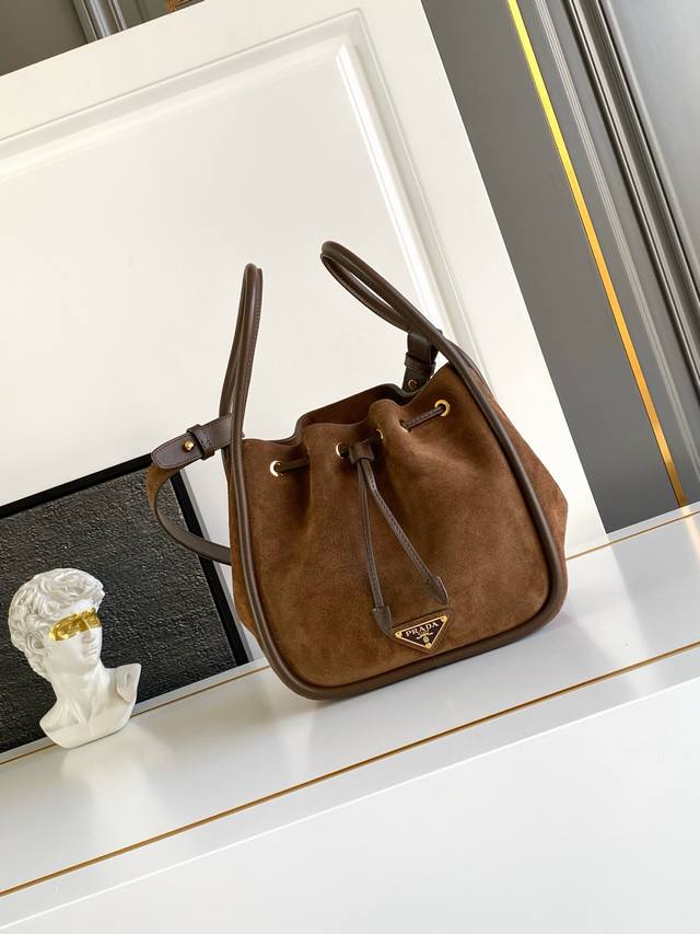 Authentic New Bucket Bag. This bucket bag is made of imported suede and comes wi