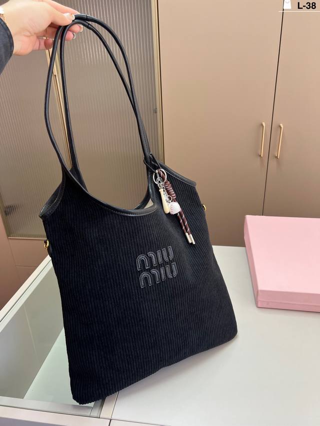 Miumiu Ivy Tote Bag Mini tote bag, a smaller version of the Ivy , is just so cu