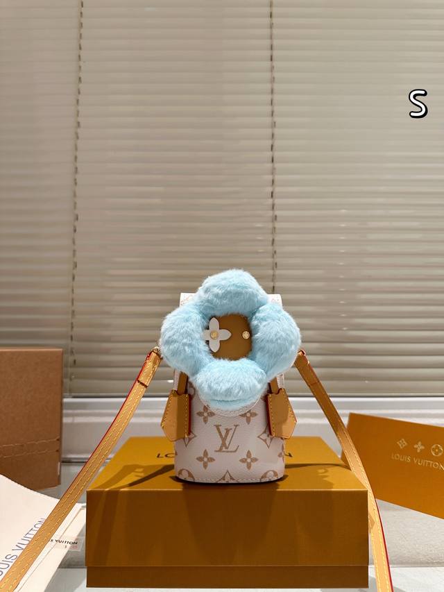 Leather version of the LV Vivienne plush phone bag. This limited-edition Christ