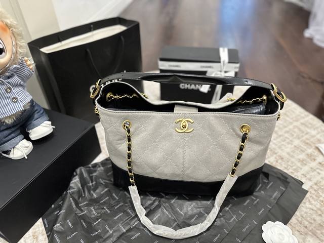 Foldable gift box packaging Chanel's new Hobo suede tote bag. I absolutely love
