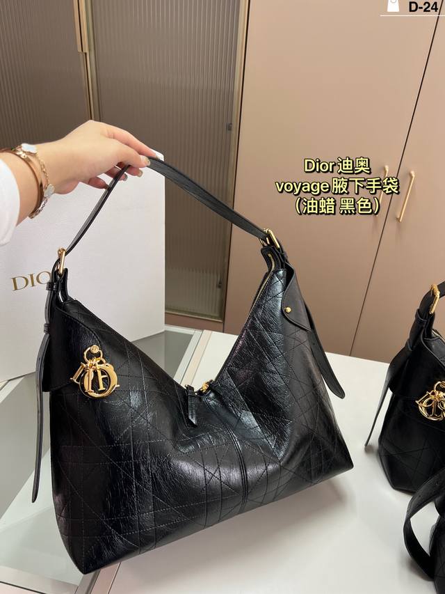 Big New Dior Voyage handbag, so cool! The new bag shape is sporty and full of d