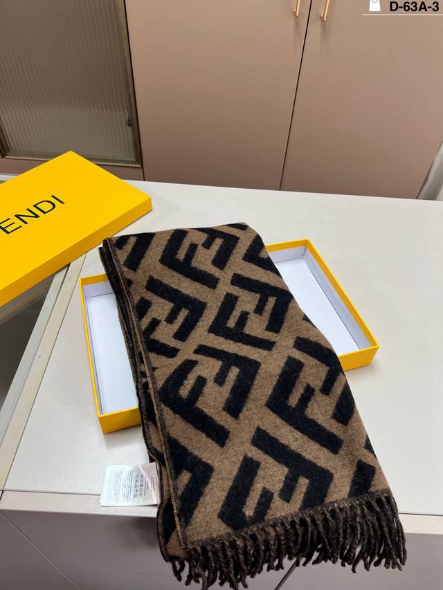 This Fendi scarf is really beautiful! The greyish-white color makes your tempera