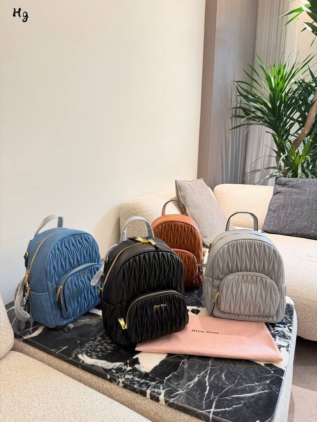 Miu Miu Pleated Backpack This Miu Miu pleated backpack is made of soft lambskin,