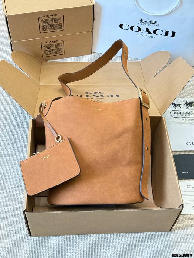 Replica suede Coach Bleecker handbag. The Coach Bleecker handbag is made of sup