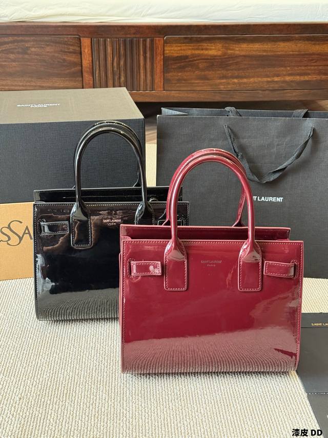 Patent Leather YSL Sac De Jour Nano Patent Leather Accordion Bag. Glossy patent