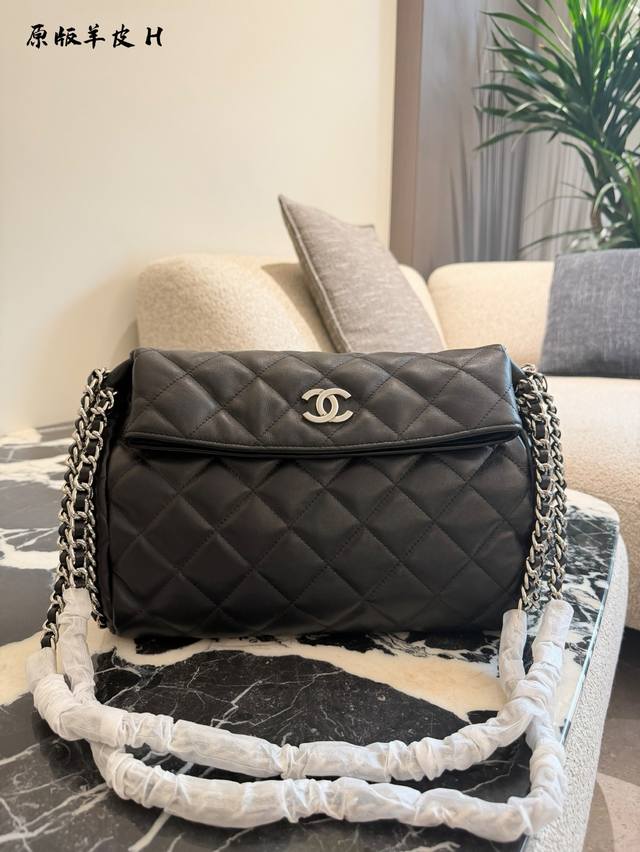 Vintage Chanel Chain Bag with Trimmed Edges This vintage Chanel chain bag featur