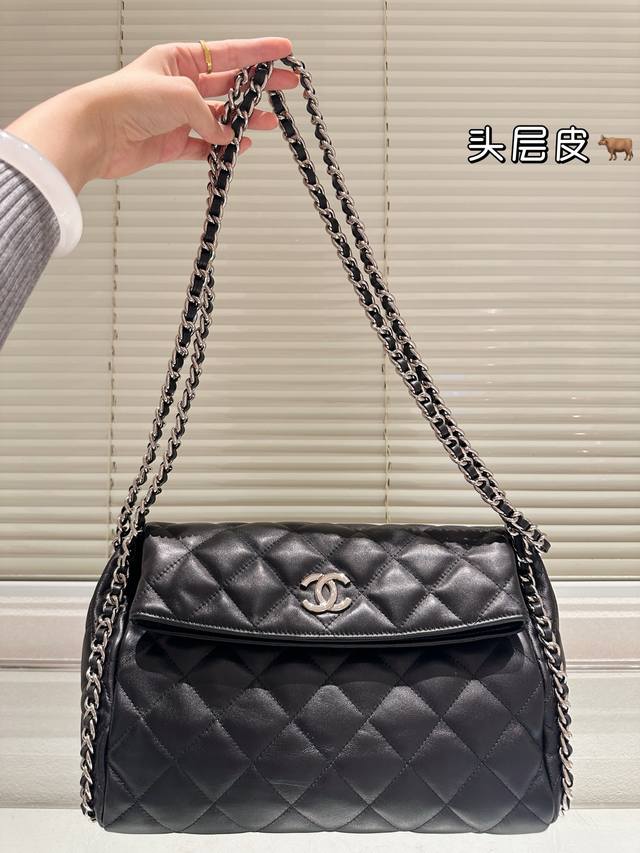 Replica Chanel Chain Bag with Top-Grain Leather Trim. This Chanel chain bag feat
