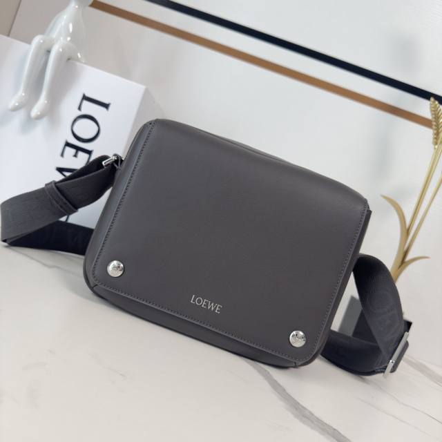 New Low-Style Small Soft Calfskin Pebble Messenger Bag. Practical and sophistica