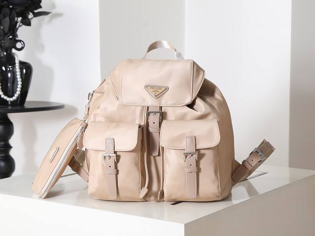 New Backpack 1Bz811 Apricot This nylon backpack features exquisite Saffiano lea