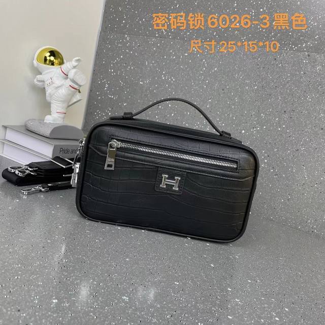 High-end men's casual clutch/crossbody bag with combination lock. Versatile des