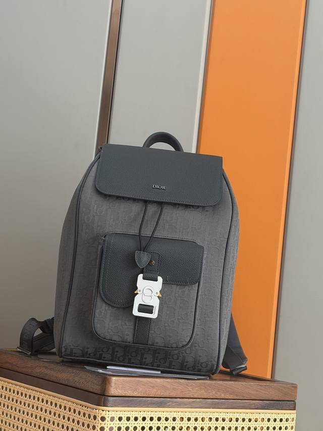 This saddle-style flap backpack features a stylish, original design that highli