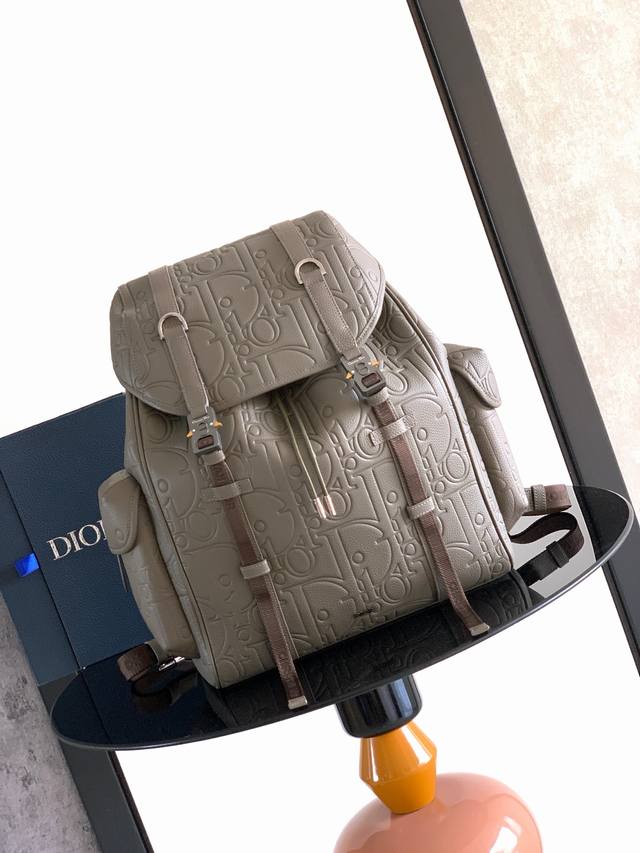 Original background. This Dior Hit The Road flap backpack seamlessly blends mod