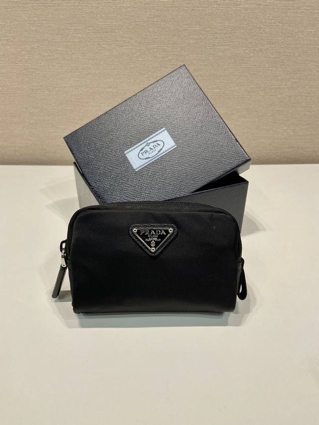 Small Clutch 1Na339 New Arrival This clutch is made from innovative Prada Re-Ny