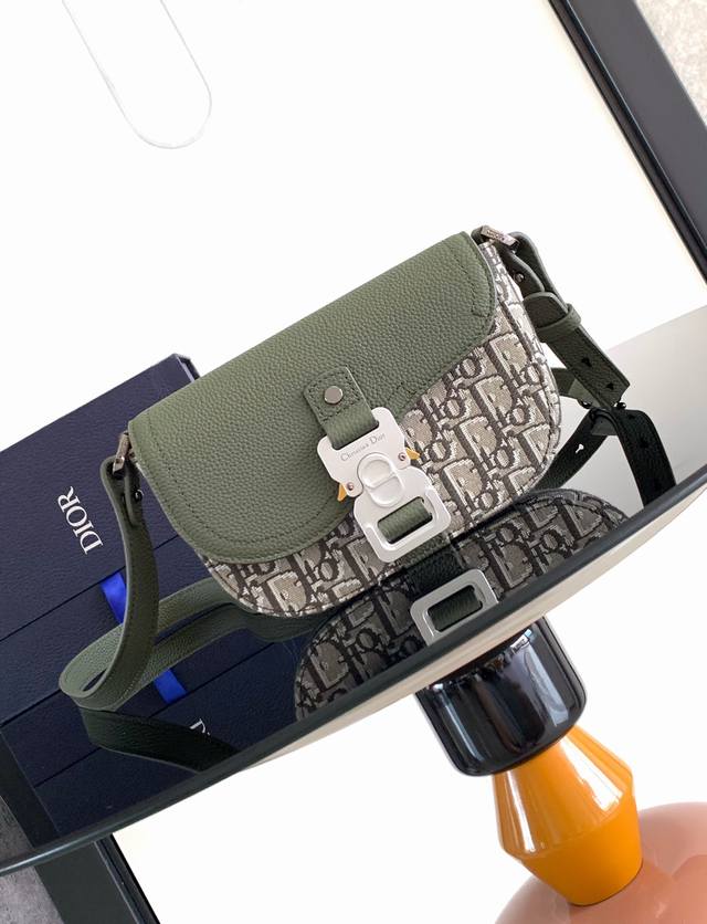 Original Background. This Saddle Messenger bag features a stylish design with a