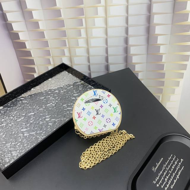 New Arrival. This Around Me handbag is crafted from Monogram coated canvas, insp