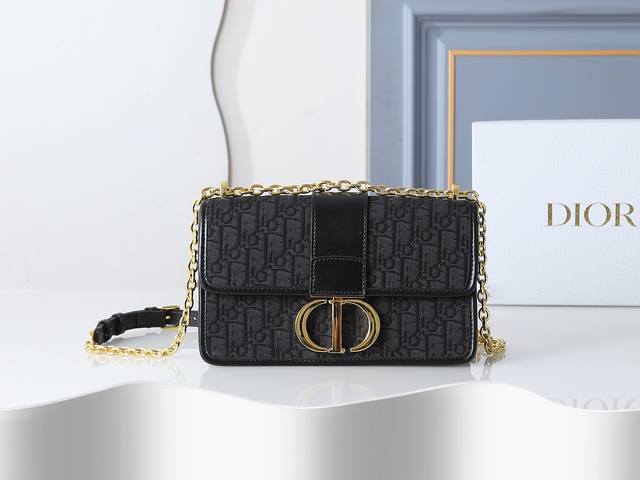 Style No. M9208, black printed fabric, this chain bag features a flap closure w