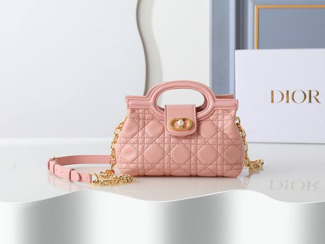 Style No. 3123 Pink Mini Chain Handbag, crafted from blush pink lambskin, featu