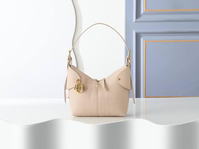 Small Beige Dior Voyage handbag (style number 2845) is crafted from beige pleate