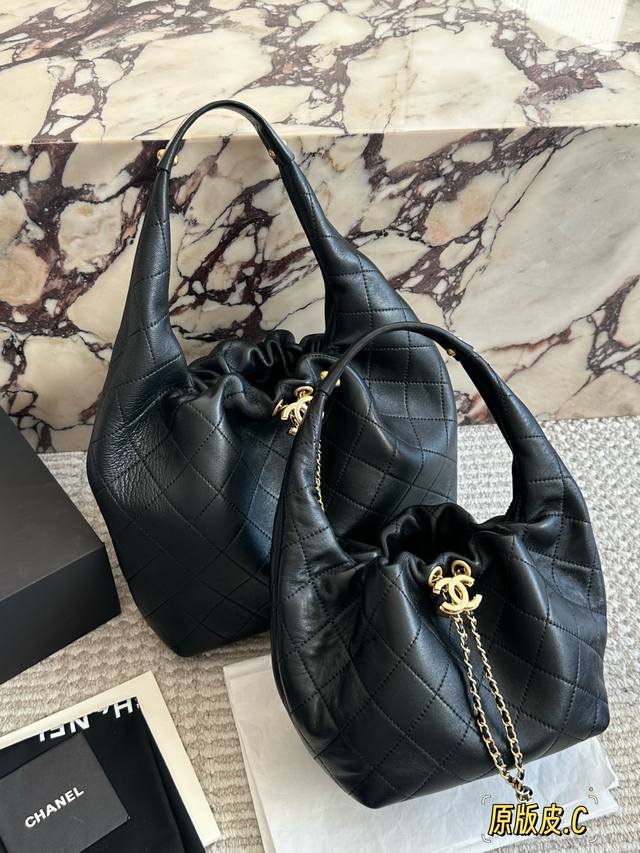 Chanel 26C Hobo Bag This is a Chanel 26C Hobo bag, made of black leather with a