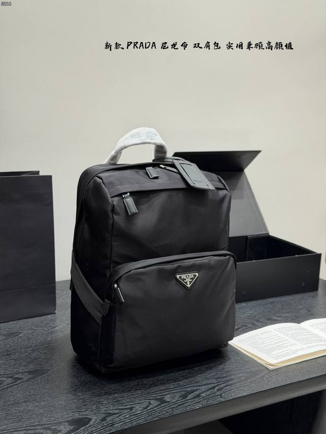 Prada Nylon Backpack ( ) Made of recycled nylon, this backpack is lightweight,