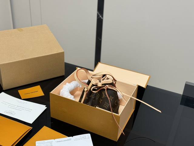 Comes with a folding box/airplane box. Size: 14*16cm. New LV Nano Bucket Bag! J