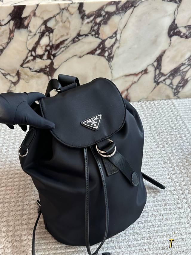 Size: 26 33cm Another day of being tempted by Prada. The Prada TL backpack exude