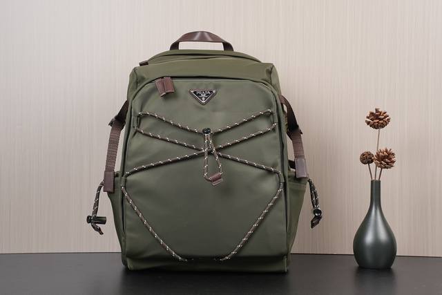 New Arrival 2Vz122_Camouflage Green This backpack is made of imported nylon fabr